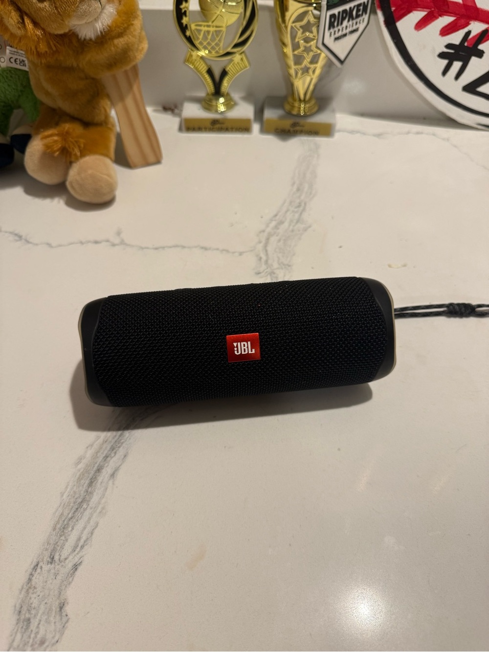 JBL Black Portable Bluetooth Speaker with Red Logo Badge